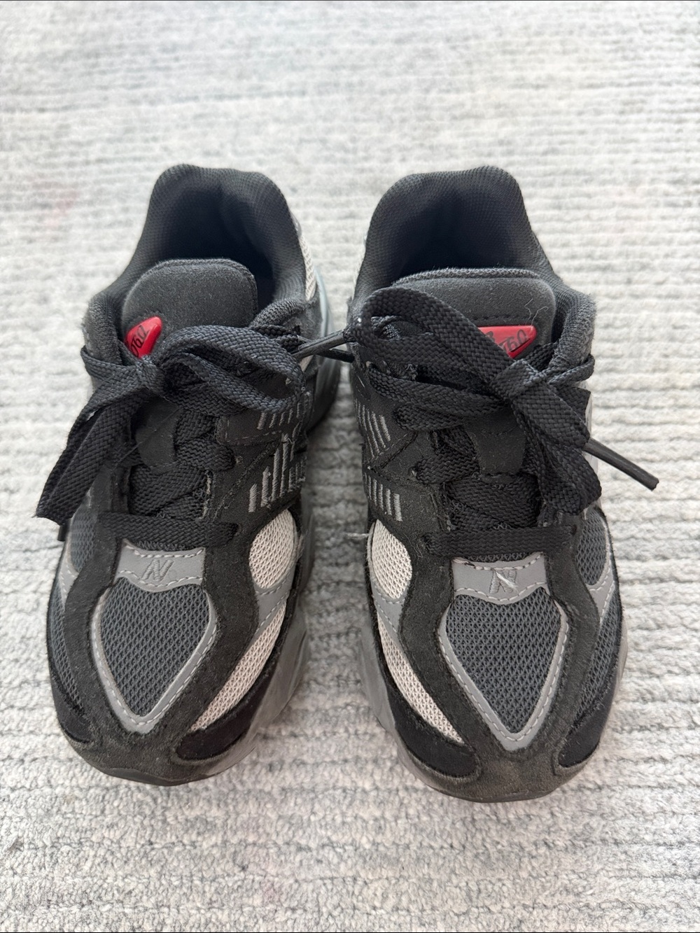 New Balance Black and Gray Kids Sneakers with Red Accent